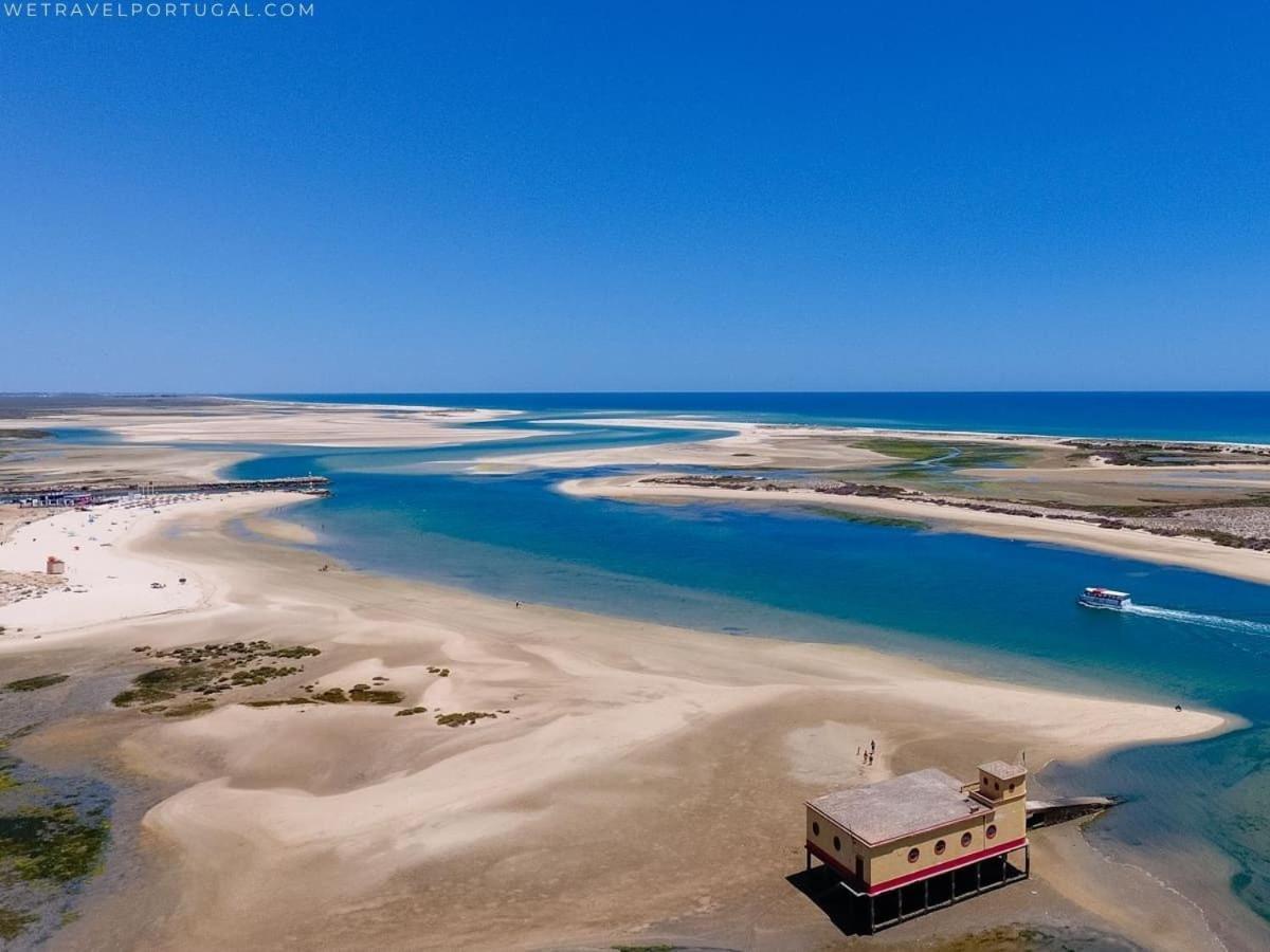 Apartamento na primeira linha da Ria Formosa Fuzeta Exterior foto